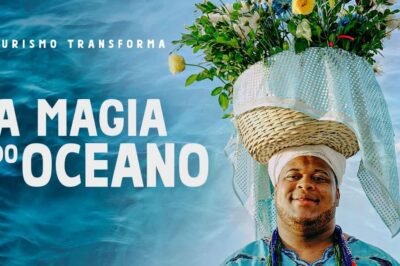 Imagem de um homem com um chapéu decorado com flores e uma cesta de palha na cabeça, simbolizando a conexão com o oceano e o turismo sustentável.